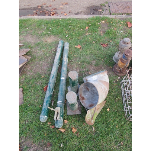 3575 - A pair of tennis net posts, etc