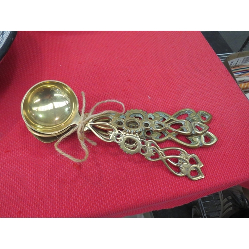 1535 - Five brass vintage love spoons, each approx 25cm length