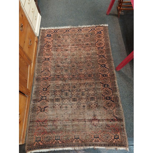 1049 - An Afghan kilim rug with red ground and multiple rows of guls, 178cm x 110cm, tasselled fringe.