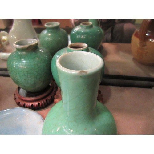 4258 - Four pieces of Oriental glazed ceramics including Celadon, some a/f, with three matched wooden stand... 