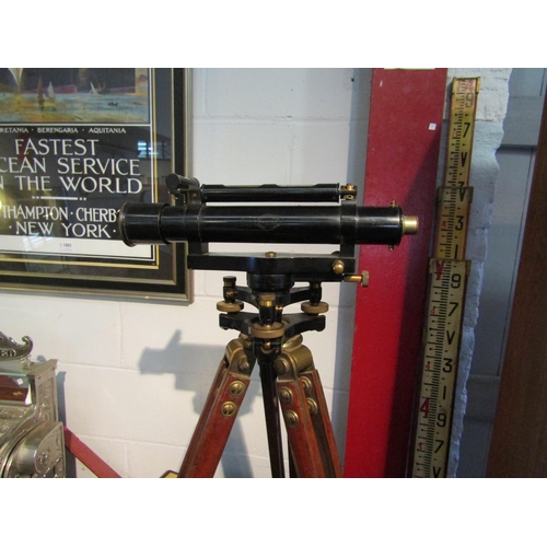 1001 - A W. Ottway & Co., Ealing, London theodolite with mahogany case, tripod and 14ft three section measu... 