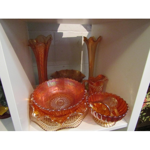 1005 - Nine pieces of orange carnival glass including two vases, bowls, dishes and jugs