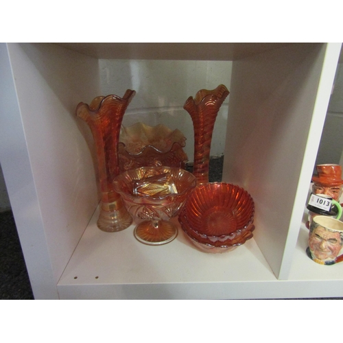 1014 - Nine pieces of orange carnival glass including two vases, dishes, bowls and jug