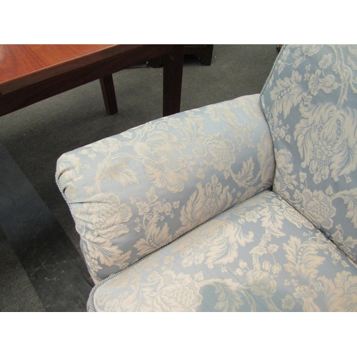 1027 - A classic style two seater sofa, rope trim, loose cushions, pale blue floral upholstery, Life Style ... 