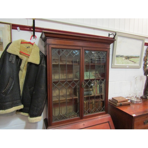 1045 - A Victorian bureau bookcase, lower cabinets having parquet base and bevel edged glass doors, upper b... 