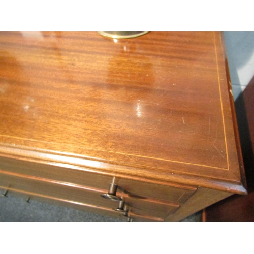 1059 - A 1960s mahogany chest of five drawers, strung inlay, square legs, 102cm high x 92cm wide x 51cm dee... 