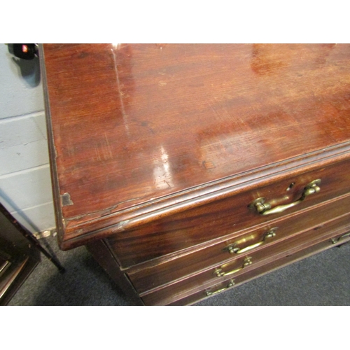 1066 - A George III mahogany chest of two short over three long drawers, brass swan neck handles, on bracke... 