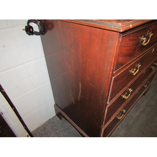 1066 - A George III mahogany chest of two short over three long drawers, brass swan neck handles, on bracke... 