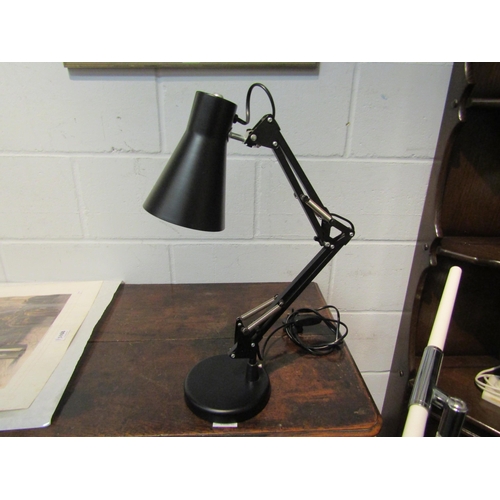 1071 - A white floor standing reading lamp and a black adjustable table lamp