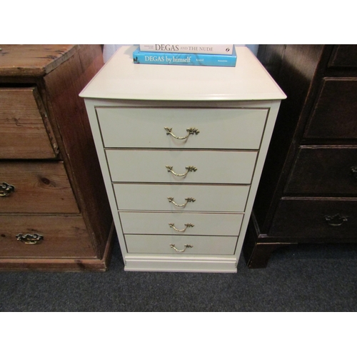 1077 - A chest of five long drawers, 77cm high x 51cm wide x 50cm deep    (D)