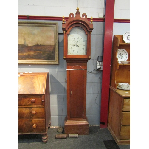 1081 - An early 19th Century Wymondham made long case clock, Roman numerated dial with aperture and subsidi... 