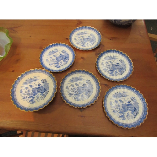 1166 - A Copeland early 20th Century footed comport and five matching cake plates, Willow pattern design (6... 