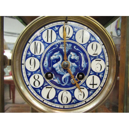 1170 - A brass four-glass mantel clock, beveled glass panels, French movement with logo for Victor Reclus, ... 