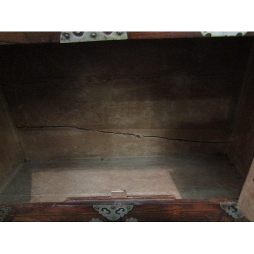 1171 - A Korean wooden cabinet with veneered front, two front doors, metal trims, on matching stand, 78cm h... 