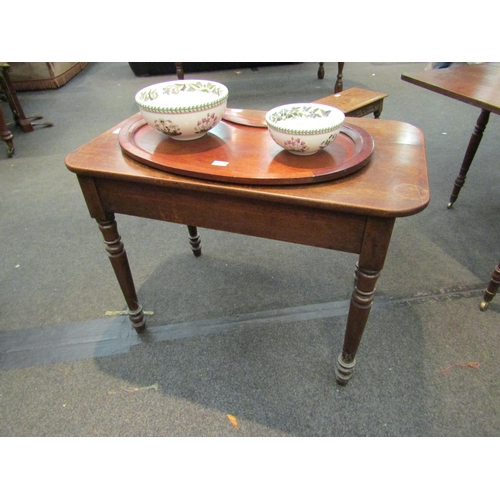 1177 - A 19th Century oak country hall table with round cornered top over plain frieze to turned supports, ... 