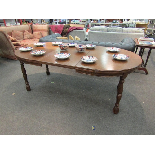 1181 - An oak extending dining table, 75cm high x 200cm long x 105cm wide extended  (E) £12-18