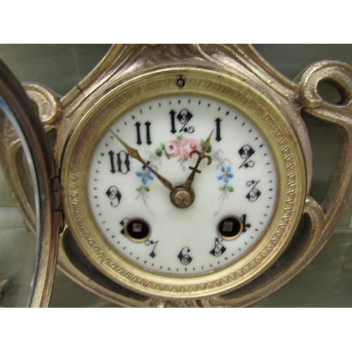 1214 - An onyx and brass French clock ca. 1880, spring driven movement signed Japy et Cie, striking on bell... 