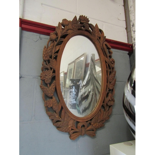 1275 - A carved surround mirror, naturalistic theme, a photo frame and an etching of Ely Cathedral from S.E... 