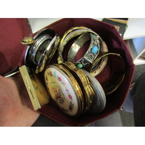 1310 - A quantity of bijouterie including compacts, bangles, necklaces, bracelets etc