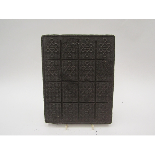 1327 - A 19th Century compressed tea brick, 19cm x 24cm  (R) £0