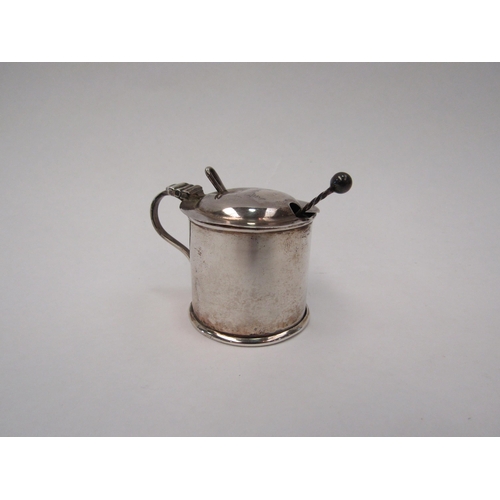 1354 - A silver mustard pot and spoon