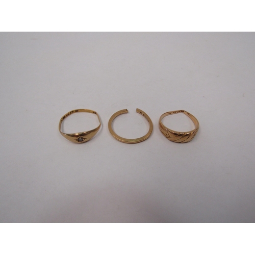 1355 - Two 18ct gold rings, worn/ split, 5.7g and a 22ct gold ring bent/ set with a single diamond, 2g