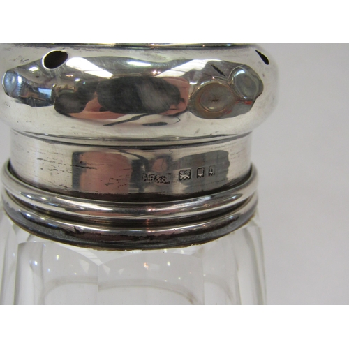 1371 - A cut glass sugar sifter with silver top