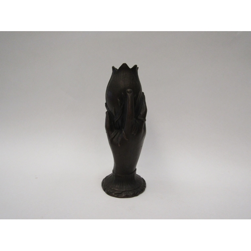 1373 - A hollow cast metal vase of a hand holding a tulip   (E) £8-12