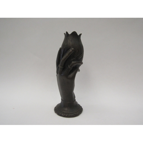 1373 - A hollow cast metal vase of a hand holding a tulip   (E) £8-12