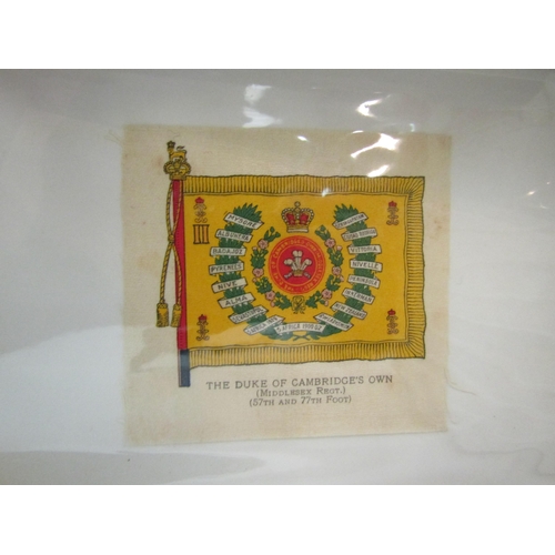 1380 - An album containing 30 regimental badges and flags printed on silk