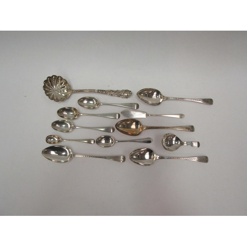 1388 - A quantity of silver spoons including sifting spoon, teaspoons etc (12)