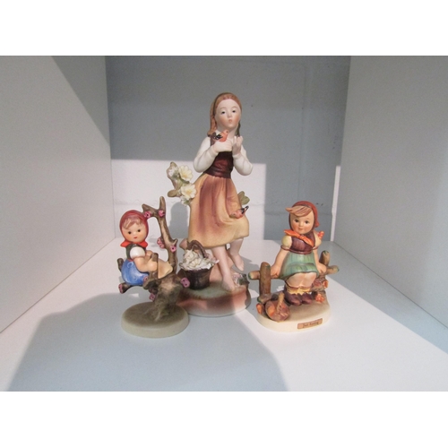 1404 - Two Hummel figures and one other Continental (3)