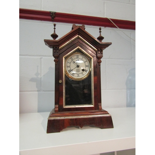 1419 - A Union Clock Company arch topped mantel clock, 41cm tall  (R) £15