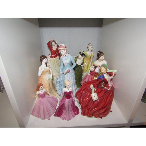 1429 - A group of lady figures, including Royal Doulton etc (9)