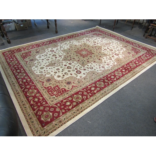 1576 - A Turkish wool rug in cream and red tones, classical design, 2.8 metres x 3.8 metres