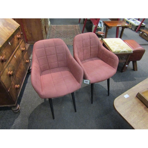 1080 - A set of four peach coloured modern tub chairs with tubular legs    (R) £60