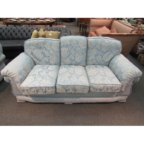 1188 - A classic style three-seater sofa, rope trim, loose cushions, pale blue floral upholstery, Life Styl... 