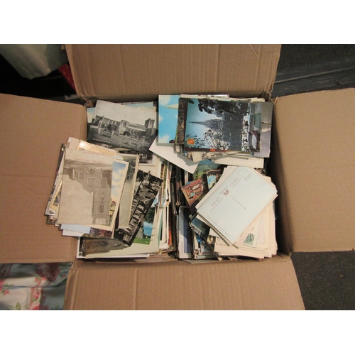 1233 - A large box of postcards early 20th Century onwards