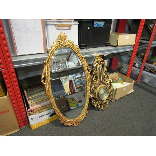 1265 - An Atsonea gilt framed wall barometer and an ornate gilt frame mirror, (74cm with frame)