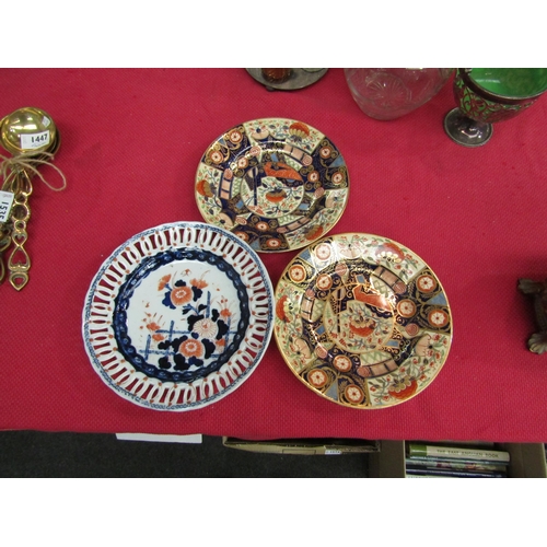 1536 - A pair of Royal Crown Derby style Imari plates enriched with gilt, together with a pierced plate (3)... 