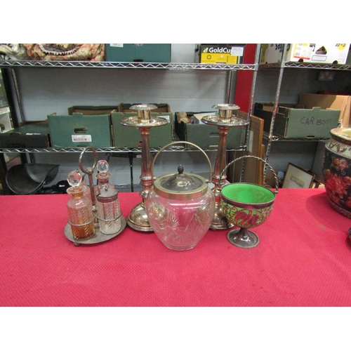 1537 - Silver plated items including a pair of weighted candlestick, cruet stand, etc