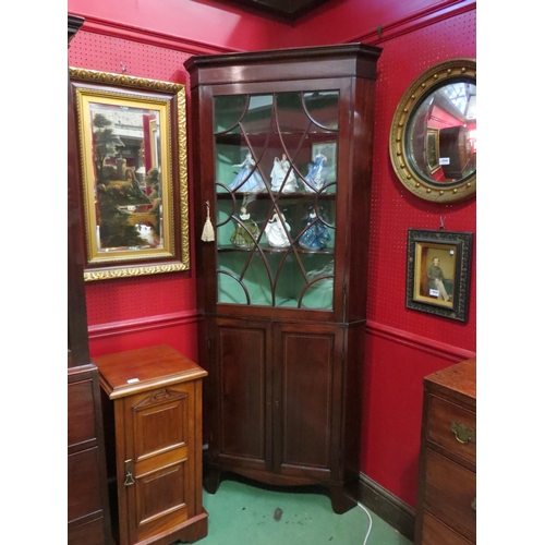 4059 - A George III line inlaid mahogany corner cabinet in the manner of 