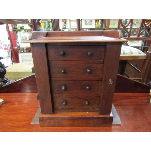 4233 - A 19th Century mahogany four drawer table-top collectors chest. 39cm high x 32cm wide x 23cm deep