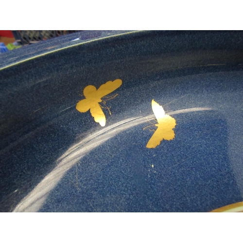 4238 - A Copeland late Spode blue glazed fruit bowl with gilt embellishment of birds and butterflies, 39cm ... 