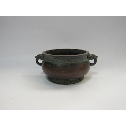 4319 - A bronze two handled censor with elephant handles and character marks  (R)    £100