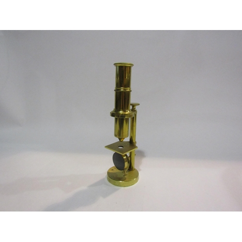 4337 - A small three-draw telescope with lens cover.  A modern brass student's monoculor microscope (2)