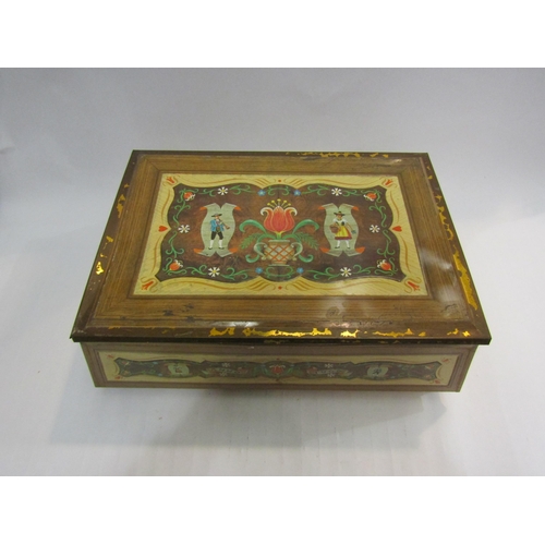 4434 - A vintage Continental biscuit tin, Swiss influence in National costume style dress, dated 1966