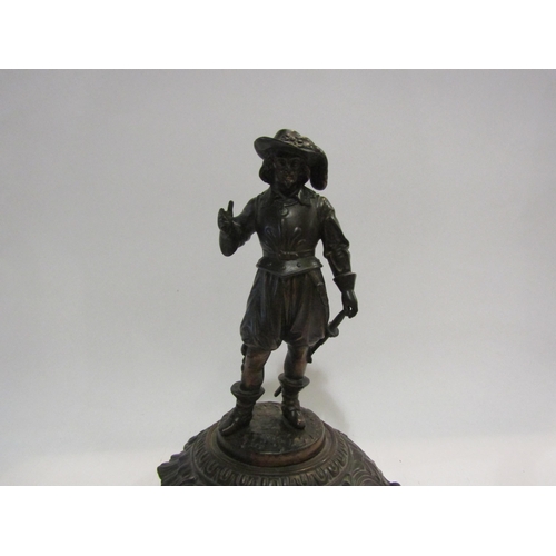 4439 - A metal figure of 16th Century man on plinth, marked 