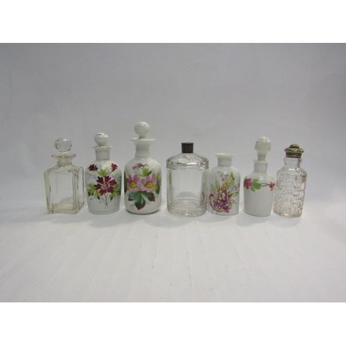 4444 - Four ceramic scent bottles with floral design, one missing stopper and three glass jars (7)