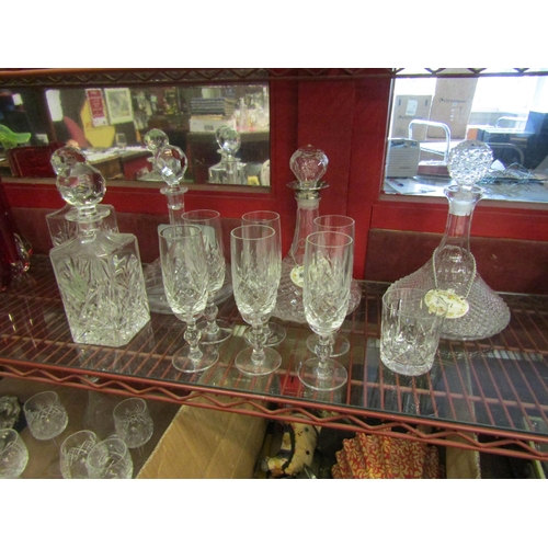 4463 - Two crystal whisky decanters, three ships decanters, six champagne flutes etc